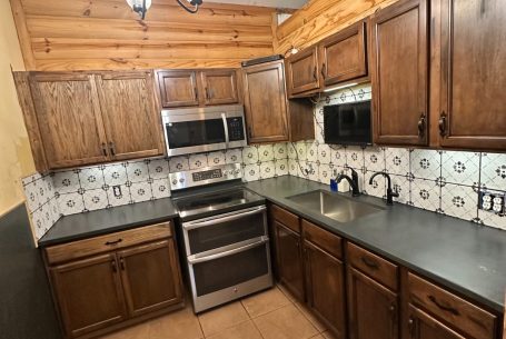 Kitchen Renovation in Robert Lee TX featuring new granite countertops and undermount sink. Kitchen renovation in Robert Lee TX featuring granite Countertops and new undermount sink by Tumbleweed Contracting.