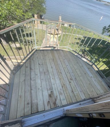 New Backyard deck installation in San Angelo TX with wood railing New Backyard deck installation in San Angelo TX with wood railing
