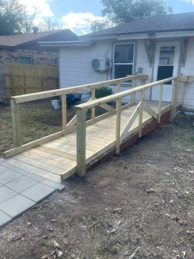Custom wooden wheelchair ramp added to San Angelo TX residential entryway. Custom wooden wheelchair ramp added to San Angelo TX residential entryway.